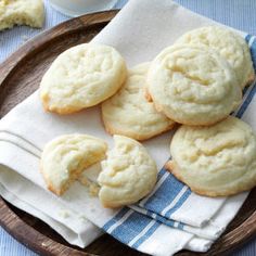 some cookies are on a plate with a blue and white towel