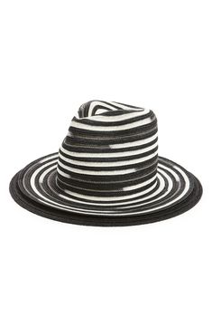 A wide brim offers enhanced protection from the sun in this stylish woven fedora fashioned with an interior fabric sweatband. Interior sweatband Hemp/cotton Dry clean Imported Modern Brimmed Panama Hat For Summer, Modern Panama Hat With Short Brim For Spring, Modern Fedora Panama Hat For Spring, Modern Beach Hats For Summer, Modern Spring Hats With Curved Brim, Modern Curved Brim Hats For Spring, Modern Spring Hat With Curved Brim, Modern Summer Beach Hats, Modern Panama Hat With Curved Brim For Summer