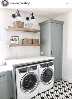 a washer and dryer in a laundry room with black and white flooring