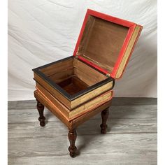 an open box sitting on top of a wooden table