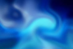 an abstract blue background with white swirls