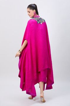 Rani pink asymmetric tunic with multi colored embellished yoke and tassel drops. Comes with matching tasseled and corded crushed cape. - Aza Fashions Cape Women, Cape For Women, Asymmetric Tunic, Rani Pink, Women Kurta, Pink Tassel, Dupion Silk, Straight Kurta, U Neck