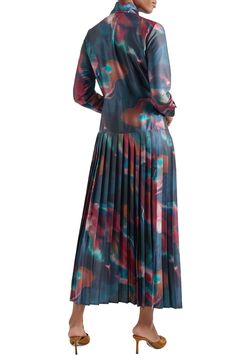 A drapey tie-neck detail tops this long-sleeve maxi dress boasting a dropped waist and a brilliantly pleated skirt on sumptuous crêpe de Chine. Fold-over tie neck Long sleeves with button cuffs 100% polyester Hand wash, line dry Imported Multicolor Pleated Long Sleeve Maxi Dress, Multicolor Long Sleeve Pleated Maxi Dress, Elegant Flowy Maxi Dress For Fall, Chic Silk Long Sleeve Maxi Dress, Chic Long Sleeve Silk Maxi Dress, Flowy Long Sleeve Maxi Dress With Pleated Sleeves, Long Sleeve Multicolor Silk Maxi Dress, Multicolor Silk Long Sleeve Maxi Dress, Multicolor Silk Maxi Dress With Long Sleeves