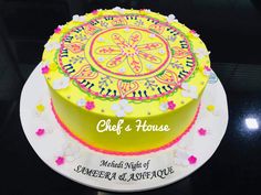 a decorated cake on a table with the name chef's house written on it