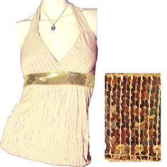 New, Never Used/Washed, Womens Cream/Ivory Sleeveless Halter Top/Blouse With Metallic Gold Striped Glitter Accent - Sleeveless Tops. With Gold Glitter Pinstripes/Striped Pattern Details In The Fabric, And Wide Gold Sequin Trim At Waistline. Top Has An Adjustable Back Neck Tie. Made In Usa. Fabric Material Is 100% Polyester. Womens Tops Great As Casual Wear, Summer Tops, Party Tops, Clubwear, Clubbing / Club Tops, Evening Tops, Etc. Hurry! We Have Limited Stocks Left For All Colors! Color: Cream/ Gold Tank Top For Evening, Beige Stretch Top For Party, Chic Beige Party Tank Top, Elegant Gold Tank Top For Party, Chic Beige Tank Top For Party, Glamorous Fitted Gold Tank Top, Chic Gold Sleeveless Halter Top, Elegant Gold Sleeveless Blouse Tank Top, Elegant Tank Top For Party Season