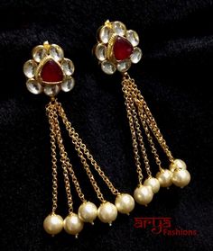 Red Kundan Jhumka/Indian Earrings/Kundan Earrings/Golden Jhumka Earrings/Indian Wedding Jewelry/Bollywood earrings/Indian Wedding Jewelry Features: Handmade Jewelry Made in Brass with high quality Kundan Stones and pearl beads 22k gold plated jewelry Length: 3 Inches Comes with push back closure Red Fusion Bridal Earrings For Festive Occasions, Red Jhumkas With Latkans For Puja, Heavy Red Jhumkas For Festivals, Red Chandbali Fusion Danglers, Red Latkans Jhumkas For Puja, Red Fusion Chandbali Danglers, Red Fusion Style Chandbali Danglers, Red Fusion Style Festive Danglers, Red Fusion Danglers For Diwali