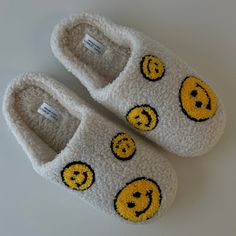 Stay cozy with a big smile on your feet! These Smiley Slippers feature a happy face and are oh-so-cute for a perfect gift. Slip into comfort and enjoy a daily dose of joy! Smiley Slippers, Smiley Face Slippers, Edgy Rings, Evry Jewels, Sleepover Activities, Cowgirl Outfits, Waterproof Jewelry, Waist Chain, Happy Face