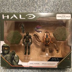 two action figures are shown in the box