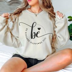 Embrace your unique self with our cozy sweatshirt featuring the empowering message Be you. The perfect blend of comfort and style! Designed to keep you warm and trendy.   Run true to size- looking for an oversize fit please size up.  Ideal for any situation, a unisex heavy blend crewneck sweatshirt is pure comfort. These garments are made from polyester and cotton. This combination helps designs come out looking fresh and beautiful. The collar is ribbed knit, so it retains its shape even after washing. There are no itchy side seams on these sweaters.  - 50% cotton, 50% polyester - Medium-heavy fabric (8.0 oz/yd² (271.25 g/m - Loose fit - Sewn-in label -Runs true to size All our shirts are made to order. Please allow time for production and shipping. Orders will ship within one week from ou Cricut Sweatshirt Ideas Women Trendy, Inspirational Oversized Sweatshirt With Letter Print, Inspirational Oversized Letter Print Sweatshirt, Oversized Inspirational Letter Print Sweatshirt, Inspirational Letter Print Long Sleeve Sweatshirt, Inspirational Long Sleeve Sweatshirt With Letter Print, Comfortable Crew Neck Hoodie With Letter Print, Inspirational Long Sleeve Letter Print Sweatshirt, Inspirational Text Print Sweatshirt With Relaxed Fit