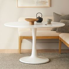 This word gets thrown around a lot these days, but in this case, "iconic" is appropriate. The Hendrick table has the sauve swoops of the Atomic "Tulip" design, but has been updated with contemporary wood stains. Ikea Tulip Table, White Tulip Table, White Oval Dining Table, Marble Tulip Table, White Round Dining Table, Tulip Dining Table, Modern Dining Tables, Wood Stains, Tulip Table