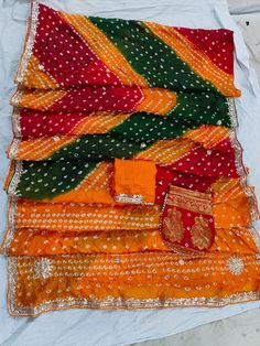 Super new design launch Beautiful multi and single colours  Beautiful Bandhej silk saree with hand gotta Patti work with blouse also gota work 👉Note: free free  beautiful ghadchola potli ( purse ) free free Potli Purse, Gotta Patti Work, Gotta Patti, Gota Work, Party Kleidung, Wedding Saree, Saree Wedding, News Design, Silk Saree