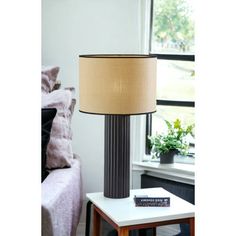 a lamp that is on top of a table