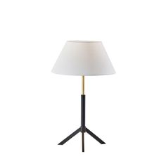 a lamp that is on top of a tripod base with a white shade over it