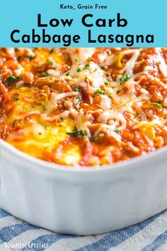 low carb cabbage lasagna in a white casserole dish with text overlay