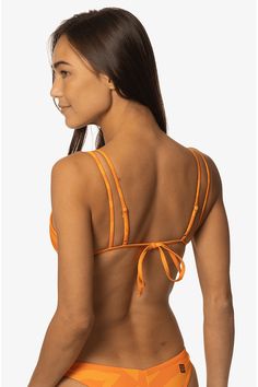 The Burleigh bikini top has a stylish scooped neck style front with tie straps - perfect for longboarding, paddling, or hanging at the beach. The Burleigh women's bikini top features one-of-a-kind strap detail for minimal tan lines and optimal support and structure. Surf from sunrise to sunset and feel fully supported all day with the Burleigh silky smooth Recycled Sea-Flex fabric. Features: Good for: Surfing, paddling, ocean activities, lifestyle Adjustable Tie Back Medium/Full Coverage (4) Hig Strappy Nylon Swimwear With Tie Back, Nylon Strappy Swimwear With Tie Back, Strappy Swimwear With Removable Bra Pads For Vacation, Strappy Swimwear With Removable Bra Pads For Beach Season, Summer Surfing Swimwear With Adjustable Straps, Adjustable Straps Swimwear For Surfing, Adjustable Straps Swimwear For Surfing And Beach Season, Adjustable Straps Swimwear For Surfing During Beach Season, Adjustable Strap Swimwear For Surfing Beach Season