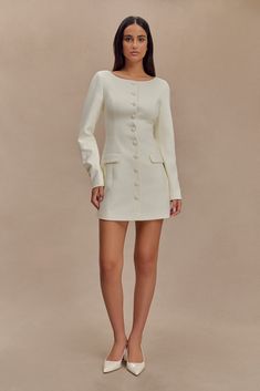 Timeless tailoring. The JOLIE Boat Neck Suiting Mini Dress epitomises refined sophistication with its classic boat neckline and structured shoulders that create a polished, tailored look. The button front closure adds a touch of elegance, while the long sleeves provide a versatile, sophisticated silhouette. The fitted waist accentuates your shape, and the flared skirt adds a playful, feminine touch. Perfect for professional settings or special occasions, the Jolie Dress seamlessly combines timel Church Clothes, Classic Boat, Fall Wear, Dresses Outfits, Fall Outfits For Work, Graduation Outfit, Church Outfits, Virtual Closet, Boat Neckline