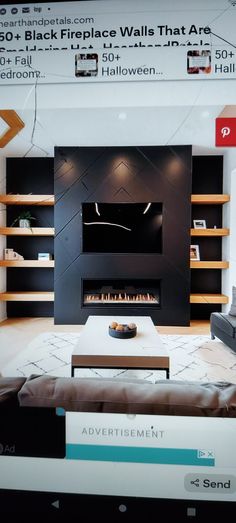 a living room filled with furniture and a fire place in the middle of it's wall