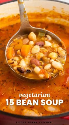 a spoon full of bean soup with the title vegetarian 15 bean soup written on it