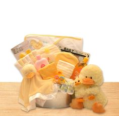 a baby gift basket with a ducky toy