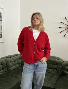 Burberry Vintage Red Wool Cardigan / Made In Scotland  Material: 100% Wool  Vintage condition level: good condition  MODEL is 5.3 ft 164 cm tall usually size S  Size: M  FLAT MEASUREMENTS (unstretched):  Length: Armpit to armpit:  Shoulder to shoulder:  Sleeve:  Every item is vintage, pre-used, pre-loved, one-of-a-kind. All orders are final and sold as-is.  If you have any questions, please contact us before purchase. Irregularities or signs of wear might be present.  Visit our shop:  https://ww Red V-neck Cardigan For Work, Red Cozy Cardigan For Layering, Vintage Solid Color Winter Cardigan, Vintage Cardigan For Winter, Red Cable Knit Winter Outerwear, Red Cable Knit Long Sleeve Cardigan, Red Long Sleeve Cable Knit Cardigan, Classic Red Outerwear For Layering, Casual Red Cardigan With Pockets