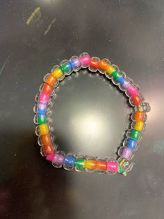 there is a bracelet made out of plastic beads