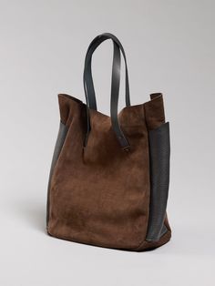 Free USA shipping. 15-30 USD international shipping. Please allow 5 days for me to cut and sew your bag before shipping. Brev Tall carryall fits everything, with casual style. This bag is roomy and relaxed, with pockets to keep you organized. Works great as a chic office tote, workout bag, picnic tote, diaper bag or general busy life carryall. Designed with a soft silhouette, the Brev Tote features signature material choices, pairing a soft, durable suede body with thick bull hide exterior pockets. Finished with metal rivets, a thick bull hide base, and an unlined interior. Specifications The Brev family consists of a Brev Medium, Brev Tall and Brev Flat. The Brev Tall is the largest body of the family. Roomy, Relaxed, Pockets Large tote with an open top is easy to carry in hand or over th Workout Bag, Vintage Gold Necklace, Picnic Tote, Workout Bags, Chic Office, Busy Life, Pocket Bag, Large Tote, Leather Jewelry