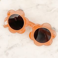 Summer is almost here! Getting your little ones ready for the sunshine with these fun flower sunnies. These sunnies best fit children ages 2-12. Cute Flower Shaped Sunglasses With Uv Protection, Playful Orange Sunglasses For Beach, Playful Flower-shaped Plastic Sunglasses, Playful Orange Plastic Sunglasses, Fun Orange Plastic Sunglasses, Fun Orange Tinted Sunglasses, Fun Spring Sunglasses With Gradient Lenses, Cute Spring Sunglasses With Gradient Lenses, Playful Spring Sunglasses With Gradient Lenses