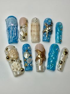 This Acrylic & Press On Nails item is sold by TWELVE27NAILSTUDIO. Ships from Riverside, CA. Listed on Jun 8, 2024 Sirencore Nails, Seashell Nails Acrylic, Blue Shell Nails, Square Beach Nails, Nails Acrylic Summer 2024, Ocean Themed Nails, Jellyfish Nails, Beach Nails Art, Nails Ocean