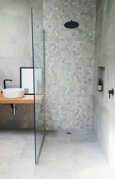 the bathroom is clean and ready to be used by someone in their home or business