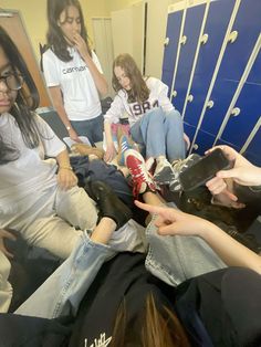 the girls are getting their hair cut and ready to go into the locker room at the school