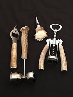 several tools are laid out on a black surface