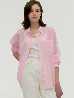 This product is a glow sheer shirt that exudes a light and airy feel, perfect for layering over casual or dressy outfits. It features a delicate, translucent fabric that adds a touch of elegance and softness to the overall look. The relaxed fit and adjustable drawstring at the waist provide both comfort and a customizable silhouette. - This shirt is crafted with a lightweight sheer fabric, offering a breezy, ethereal quality ideal for spring and summer days.- Designed with a button-down front and classic collar, it combines traditional shirt elements with a modern, sheer twist.- The adjustable drawstring waist allows the wearer to tailor the fit to their liking, enhancing the shirt's versatility.- Its long sleeves can be rolled up for a more relaxed look or left down for a more formal Pink Relaxed Fit Feminine Shirt, Pink Long Sleeve Blouse With Sheer Sleeves, Chic Pink Blouse With Sheer Sleeves, Pink Sheer Sleeves Blouse For Spring, Pink Blouse With Sheer Sleeves For Spring, Spring Sheer Blouse For Layering, Sheer Blouse For Spring Layering, Trendy Shirt For Spring Layering, Feminine Pink Shirt For Summer