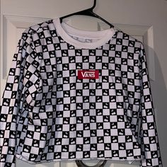 Never Worn Vans Long Sleeve Graphic Print Top, Vans Black Tops With Graphic Print, Vans Black Top With Graphic Print, Black Vans Tops With Graphic Print, Black Vans Crew Neck Top, Black Crew Neck Vans Top, Trendy Cotton Vans Top, Black Casual Vans Top, Vans Tops For Spring Streetwear