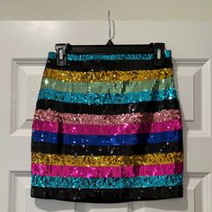 Nwt Express Multi-Color Sequin Stripe Mini Skirt New With Tags; Never Worn. Size Xs Sequin Mini Skirt Features An Elastic Waist And Horizontal Stripes Of Turquoise, Black, Gold, Sea Foam Green, Rose Pink, Hot Pink, And Royal Blue Sequins. Mini Skirt Is Lined. Pull On Styling. Skirt Shell Is 95% Cotton And 5% Spandex. Skirt Lining Is 100% Polyester. Hand Wash Pink And Royal Blue, Multicolor Sequins, Skirt Lining, Sequin Mini Skirt, Sequin Mini Skirts, Green Rose, Horizontal Stripes, Sequin Mini, Seafoam Green