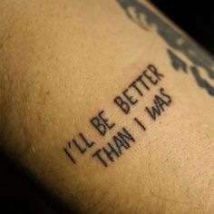 a man with a tattoo on his arm that says i'll be better than i was