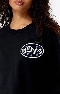 Show some love for your fave popstar with the Olivia Rodrigo Guts Crew Neck Sweatshirt. Adorned with iconic puff graphics inspired by the artist, this sweatshirt adds a trendy flair to your wardrobe while keeping you cozy and comfortable all day long..Solid color sweatshirt.Long sleeves.Crew neckline.Olivia Rodrigo puff graphic.Ribbed trimming.50% cotton, 50% polyester.Machine washable.Model is wearing a size small.Model measurements: 5’6” height, 30” bust, 25.5” waist, 36.5” hip Trendy Crew Sweatshirt With Logo Print, Trendy Crew Neck Sweatshirt With Logo Print, Pop Culture Crew Neck Sweatshirt With Letter Print, Pop Culture Screen Print Sweatshirt For Streetwear, Pop Culture Graphic Print Sweatshirt For Fall, Pop Culture Letter Print Sweatshirt In Relaxed Fit, 90s Inspired Graphic Print Tops For Fall, 90s Inspired Graphic Print Fall Tops, Trendy Fall Graphic Sweatshirt