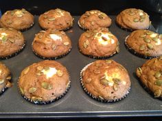 twelve muffins are sitting in a baking pan