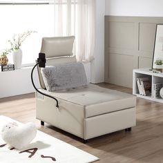 a white chair sitting on top of a hard wood floor next to a book shelf