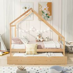 a child's bedroom with a doll house bed