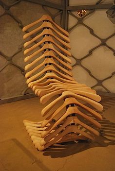 a stack of wooden spoons sitting on top of a table