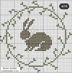 a cross stitch pattern with an animal on it