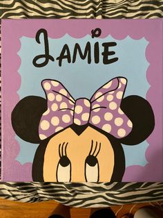 a painting of minnie mouse with a name on it