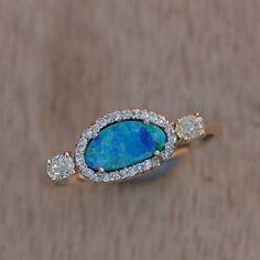 "\"Details: Item code :- ATR-2103 - 14K yellow solid gold (as shown) wt :1.55 gm - 0.28 ct diamonds - 0.48 ct opal - ring size 16 x 7 mm & Ring size 7 us Anjis touch jewelry supports ethical and eco-friendly practices and uses reclaimed and recycled metals whenever possible About my jewelry: All of the Anjis touch jewelry collection is handmade exclusively by me.  I hope that you will enjoy wearing my designs as much as I enjoy making them! Shipping: We have this in stock which we can ship in 1- 14k Gold Halo Ring With Diamond Accents, Dazzling Diamond Opal Ring For Anniversary, Dazzling Diamond Opal Anniversary Ring, Oval Halo Ring With Diamond Accents In 14k Gold, 14k Stamped Diamond Halo Ring, Yellow Gold Diamond Halo Ring With Gemstone, Fine Jewelry Opal Ring With Diamond Halo Setting, Fine Jewelry Diamond Opal Ring With Halo Setting, Fine Jewelry Diamond Halo Opal Ring