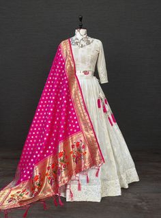 Spread the aura of freshness with this prominent white color lehenga choli in georgette material embellished with Sequins and thread embroidery work. Lehenga(Stitched) Lehenga Fabric : Georgette  Lehenga Work : Sequins and Thread Embroidery Work Waist : Supported up to 42  Stitching : Stitched With canvas  Lehenga closer : Drawstring With Heavy Hand Made Tassels Length : 41 Flair : 3.4 Meter  Dupatta Dupatta Fabric : Jacquard(Pethani) Dupatta Work : Thread Weaving Dupatta Length : 2.5 Meter Blou White Color Lehenga, Beautiful Lengha, White Lehenga Choli, Lehenga Stitched, Lehenga Choli Latest, Ghaghra Choli, Georgette Material, Indian Bridesmaid Dresses, White Lehenga