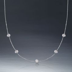 Ross-Simons - 1.00ct t. w. Bezel-Set Diamond Station Necklace in 14kt White Gold. 20". The classic look of a bezel-set diamond station necklace. Our must-have design is always in style - any outfit, any occasion. Totaling 1.00 carat, five round brilliant-cut diamonds spark a 14kt white gold cable chain. This is the piece you've been seeking to complete your collection. Lobster clasp, diamond station necklace. Diamond birthstones are the perfect gift for April birthdays. Classic Station Necklace With Bezel Setting For Anniversary, Classic Round Station Necklace For Formal Occasions, Classic Bezel Set Station Necklace For Anniversary, Classic Diamond Cut Station Necklace For Formal Occasions, Classic Diamond Cut Station Necklace For Formal Events, Classic Cubic Zirconia Station Necklace For Anniversary, Classic Solitaire Necklace With Pave Setting, Fine Jewelry Station Necklace With Single Cut Diamonds, Classic Brilliant Cut Station Necklace For Anniversary