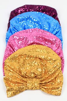 One part exotic, one part glam...this glittering, sequined, fashion turban is all parts show-stopping style!! Sparkle in the sunshine, sparkle in the disco light...this piece has it's own magic and looks as great with a simple t-shirt as it does with a festive maxi dress!! Tuck your hair up into it for a 1920's take on the item, or let your hair fall loose for a more bohemian vibe. ♥Extra stretchy; One size will fit most. ♥95% polyester; 5% spandex sequin fabric. ♥Lined with 95% Rayon; 5% spande Gold Turban Headband For Party, Gold Turban Style Headband For Party, Gold Headwrap Headband For Party, Adjustable Gold Headwrap For Party, Summer Party Headband Headwrap, Adjustable Summer Party Turban, Summer Party Headband Wrap, Summer Party Adjustable Headwrap, Adjustable Summer Headwrap For Party