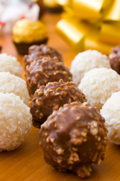 chocolate and coconut balls on a wooden table