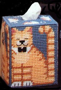 a cross stitch tissue box with a cat on it