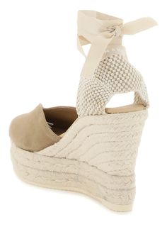 Espadrilles by Manebi with suede front upper with heart-shaped neckline and knotted ribbon at ankle. Woven rope covered wedge, leather interior, rubber sole. Size Info IT Color Detail Beige Made In Spagna Material 100% leather Season One spring Season Two summer Product shoes Brand Manebi Size And Fit Heel Height = 11 cm Chic Cream Espadrille Wedge Sandals, Cream Wedge Espadrille Sandals With Woven Sole, Cream Espadrille Wedge Sandals With Woven Sole, Beige Wedge Espadrilles With Textured Sole, Beige Espadrille Wedge Sandals With Wrapped Heel, Chic Straw Espadrilles With Wrapped Heel, Cream Wedge Heel Espadrilles In Straw, Beige Wedge Espadrilles With Wrapped Heel, Beige Espadrilles With Wrapped Wedge Heel