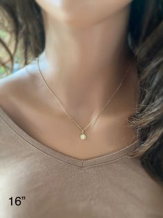 "This solid 14k gold charm is stunning and has a great detail. The slightly curved sun beams and its dome shape add dimension. The pendant measures approximately 8 mm. Now available with the 16 or 18\" dainty solid 14k gold chain. The sun will be suspended on 4 mm open bail (see 1st photo) If you only purchasing the charm, select bail size: 4 mm 14k open jump ring bail and can accommodate chains up to 1.6 mm. 6 mm 14k closed bail that can suit thicker necklaces. Hallmarked 14K 14k sand dollar ch Dainty Sun Design Jewelry For Everyday Wear, Dainty Sun Design Jewelry For Everyday, Dainty Everyday Sun Design Jewelry, 14k Yellow Gold Jewelry With Sun Design, 14k Yellow Gold Sun Design Jewelry, Everyday Yellow Gold Sun Design Jewelry, Everyday Yellow Gold Jewelry With Sun Design, Sterling Silver Jewelry With Sun Design In Yellow Gold, 14k Gold Sun Design Jewelry Gift